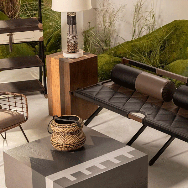 Finished furniture combining wood metal stone and upholstery