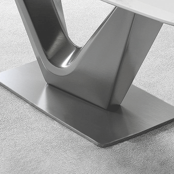 Furniture with refined brushed metal finish and details