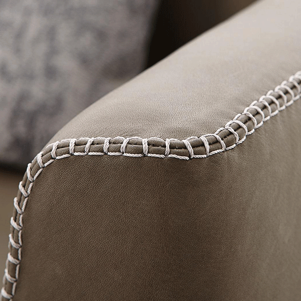 Custom upholstered furniture with fabric and stitching details